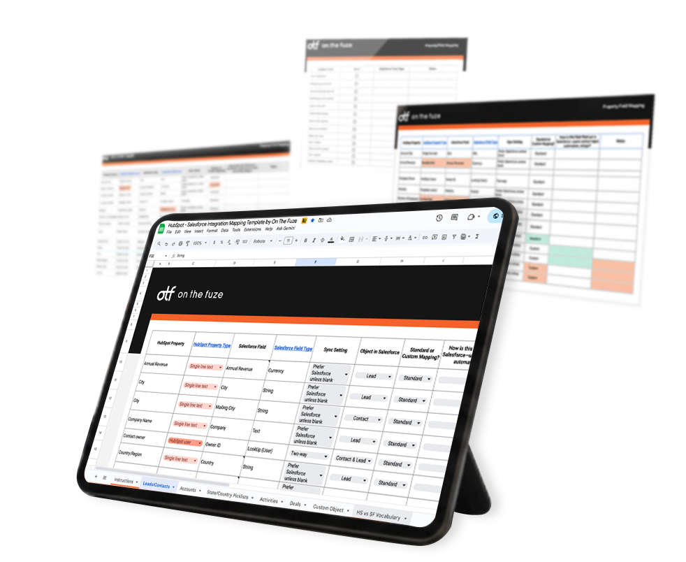 Tablet displaying a Salesforce-HubSpot integration mapping template with data fields being synchronized between the two CRM platforms, showing field mappings, object relationships, and data flow configurations in a spreadsheet interface